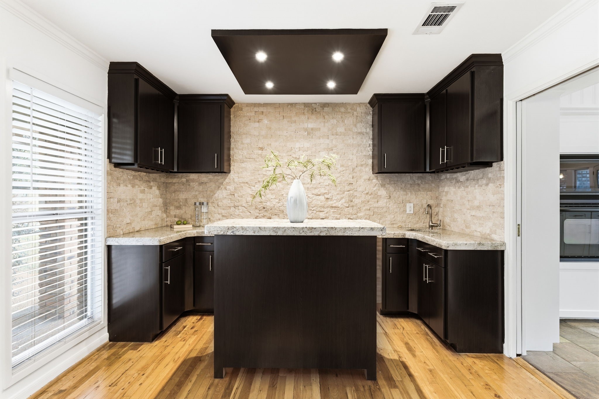 531 Azaleadell Drive Houston, TX 77018 - Photo 13 of 37 a kitchen with stainless steel appliances granite countertop a sink and a microwave