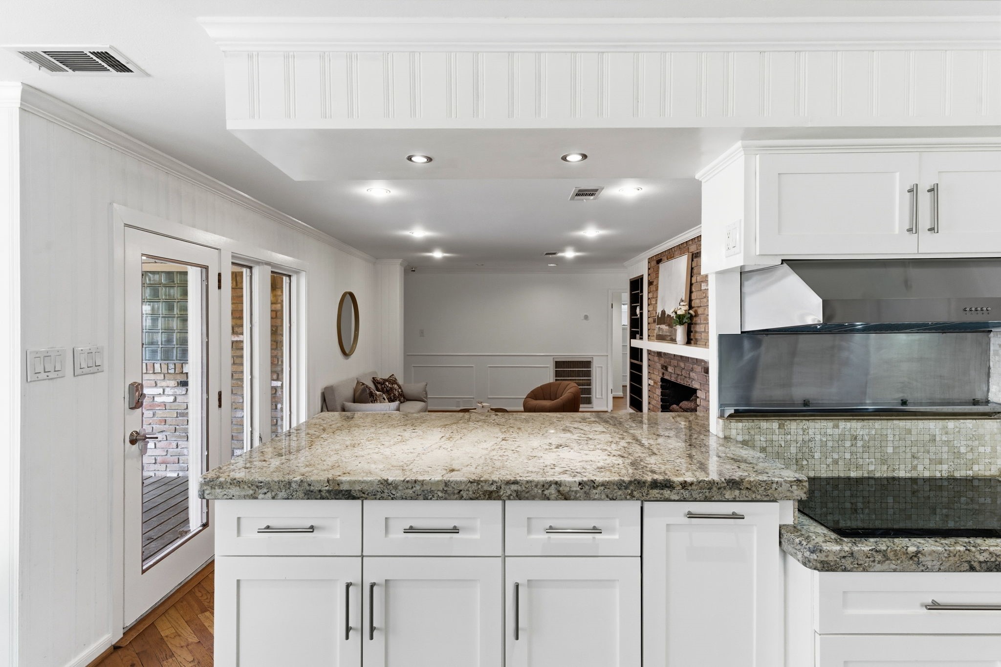 531 Azaleadell Drive Houston, TX 77018 - Photo 15 of 37 a kitchen with stainless steel appliances granite countertop a sink and cabinets