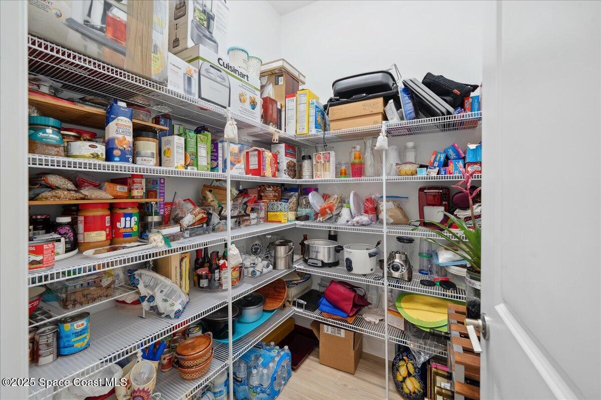 3234 Laming Way Melbourne, FL 32940 - Photo 16 of 59 a room with storage and utility racks