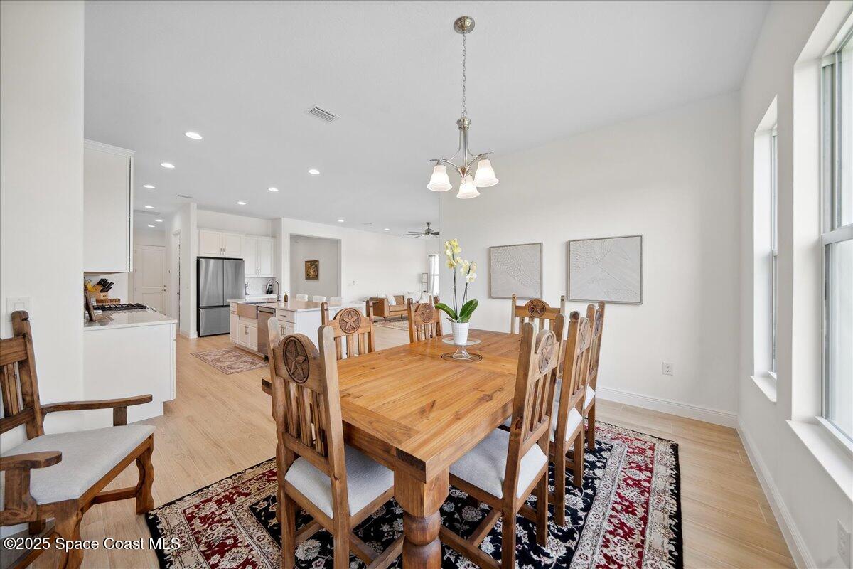 3234 Laming Way Melbourne, FL 32940 - Photo 19 of 59 a view of a dining room with furniture