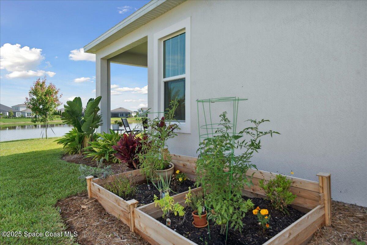 3234 Laming Way Melbourne, FL 32940 - Photo 40 of 59 a front view of a house with a yard