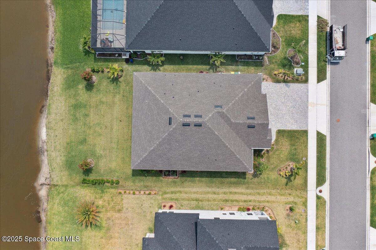 3234 Laming Way Melbourne, FL 32940 - Photo 46 of 59 a aerial view of a house with a yard