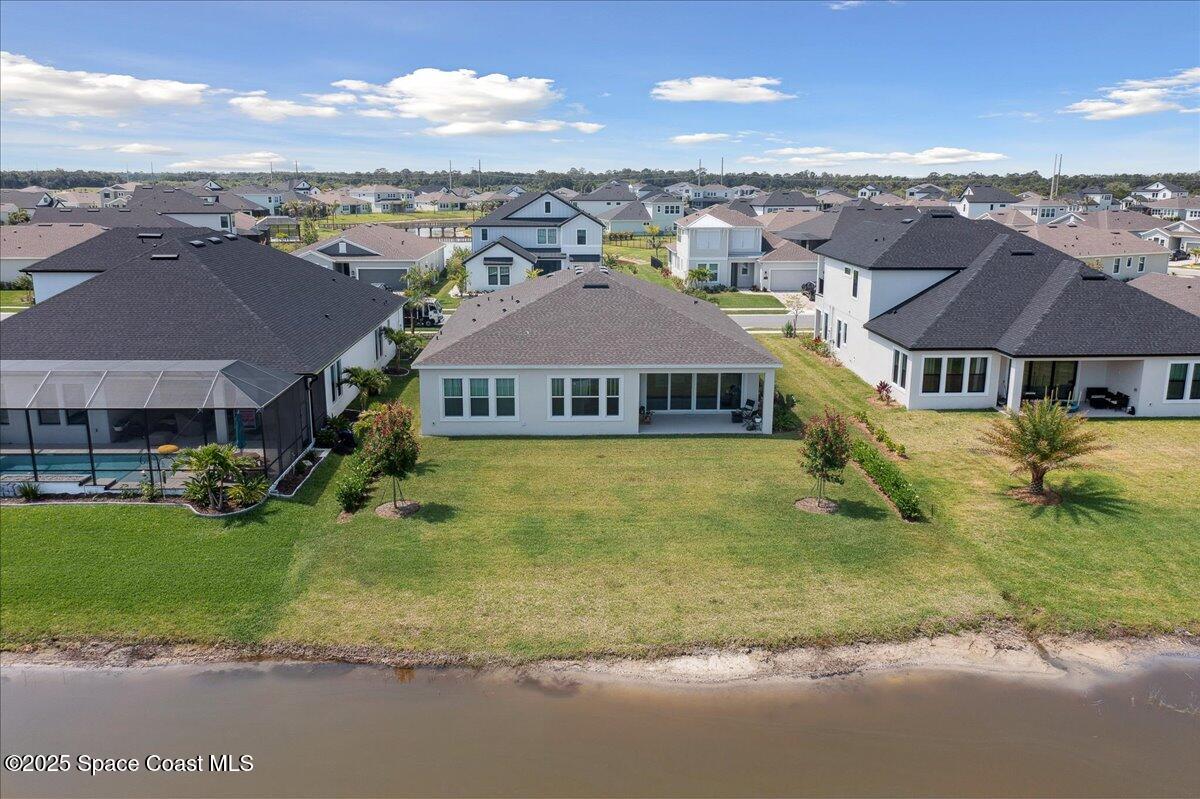3234 Laming Way Melbourne, FL 32940 - Photo 47 of 59 a front view of a house with a yard