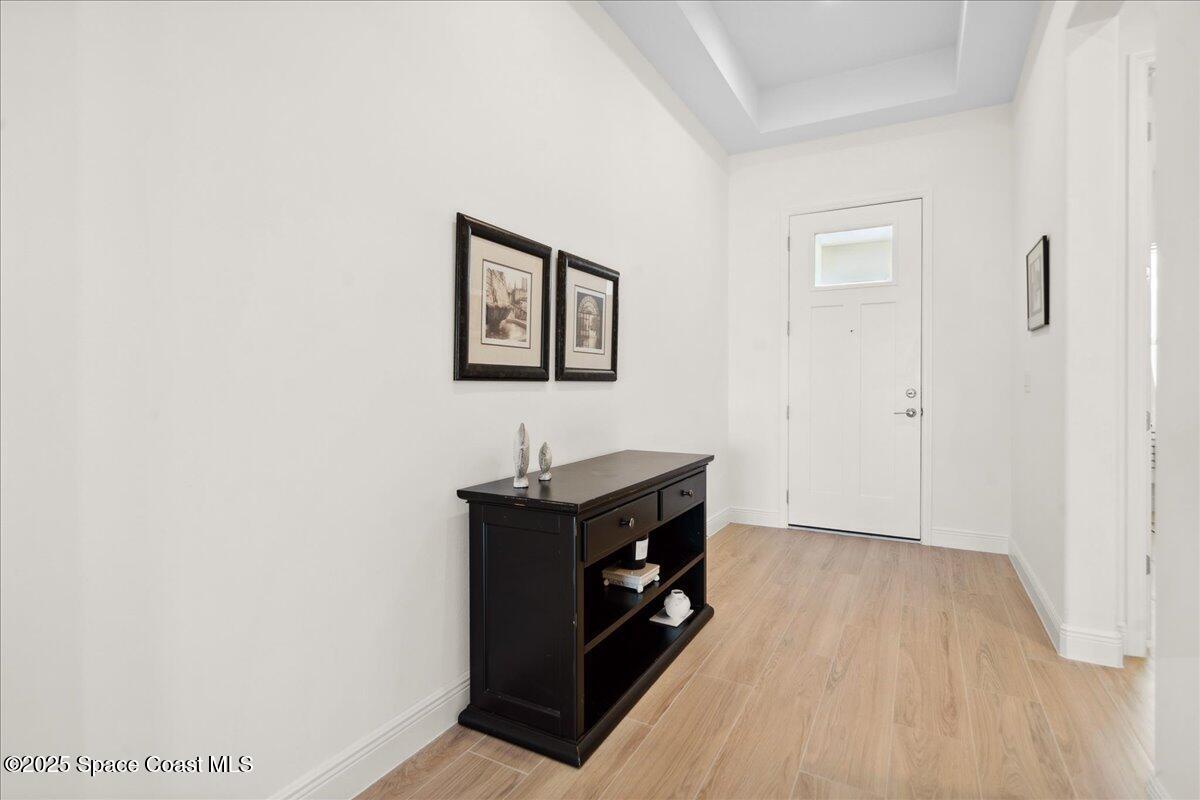 3234 Laming Way Melbourne, FL 32940 - Photo 5 of 59 a view of a hallway with front door