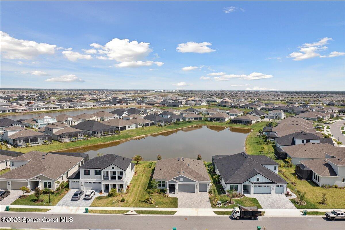 3234 Laming Way Melbourne, FL 32940 - Photo 51 of 59 an aerial view of residential houses with outdoor space