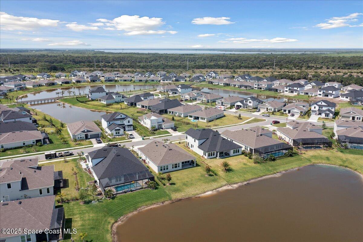 3234 Laming Way Melbourne, FL 32940 - Photo 54 of 59 an aerial view of residential houses with outdoor space