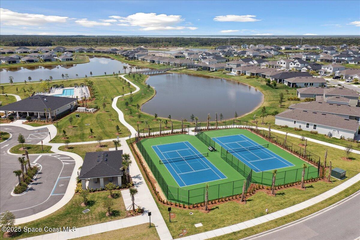 3234 Laming Way Melbourne, FL 32940 - Photo 57 of 59 an aerial view of residential houses with outdoor space