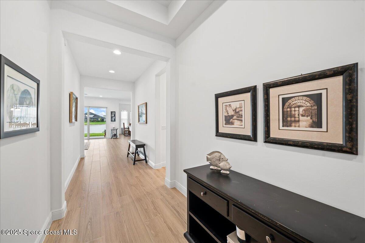 3234 Laming Way Melbourne, FL 32940 - Photo 6 of 59 a view of a workspace with wooden floor