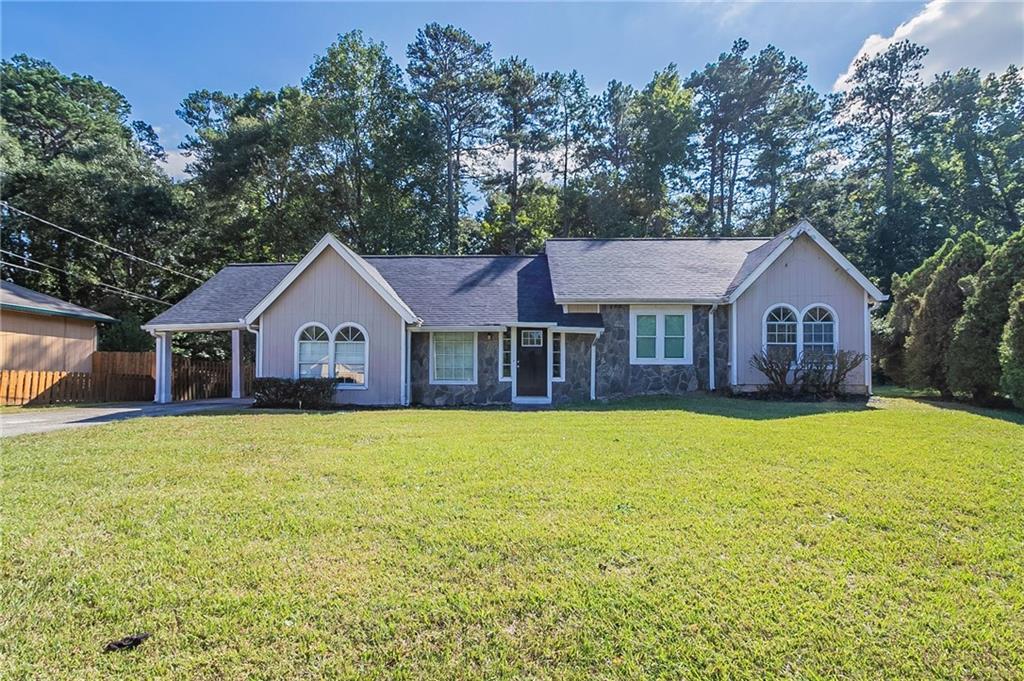 2176 Leslie Brook Drive Decatur, GA 30035 - Photo 1 of 1 a front view of a house with yard and green space
