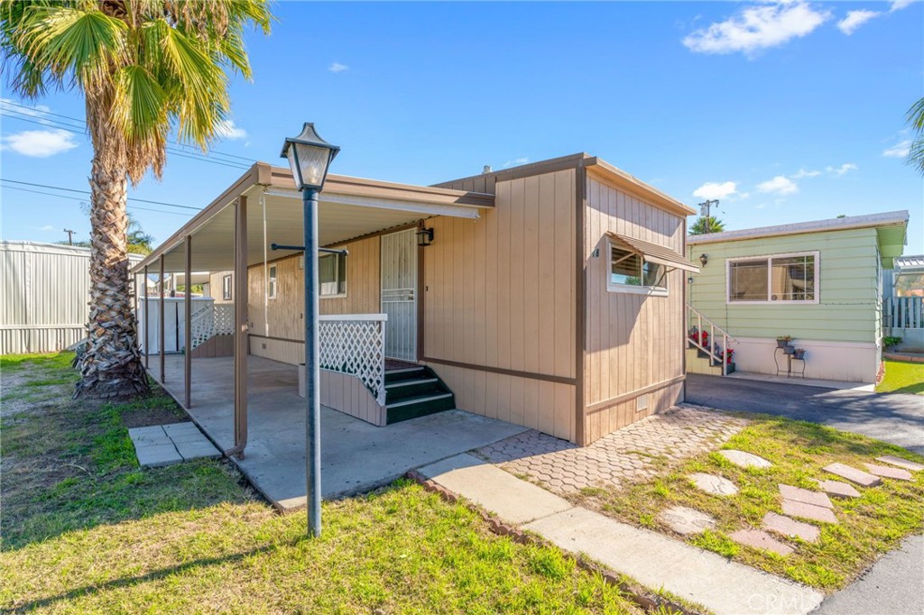 a view of a backyard of the house