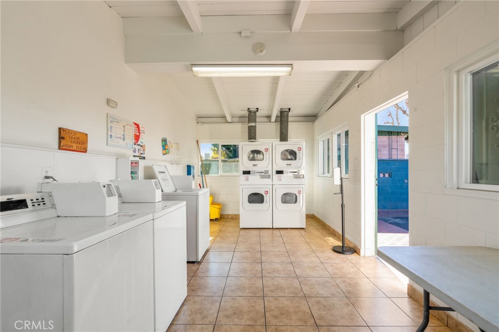 26235 9th Street, Unit 18 Highland, CA 92346 - Photo 21 of 31 a kitchen with a sink cabinets and window