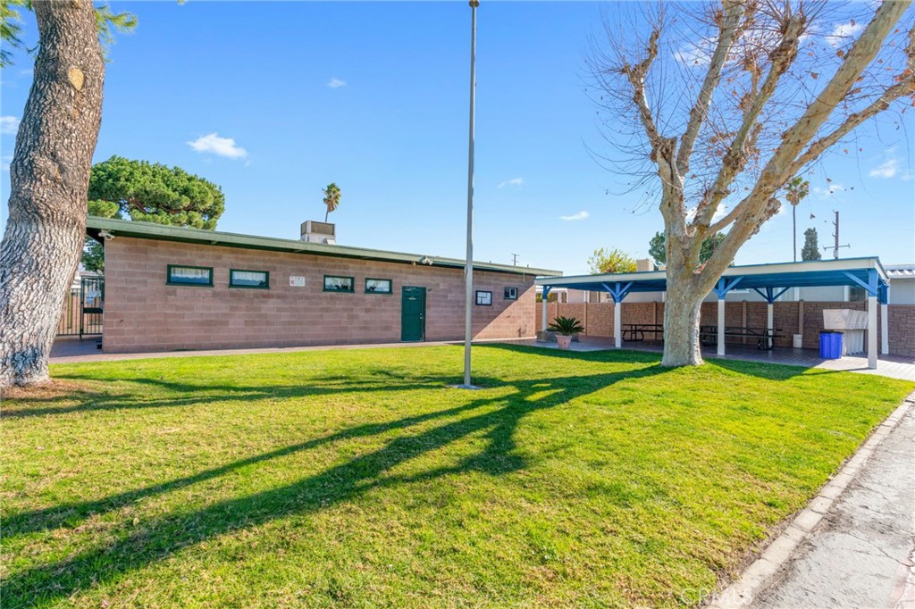 26235 9th Street, Unit 18 Highland, CA 92346 - Photo 22 of 31 a view of a house with a big yard