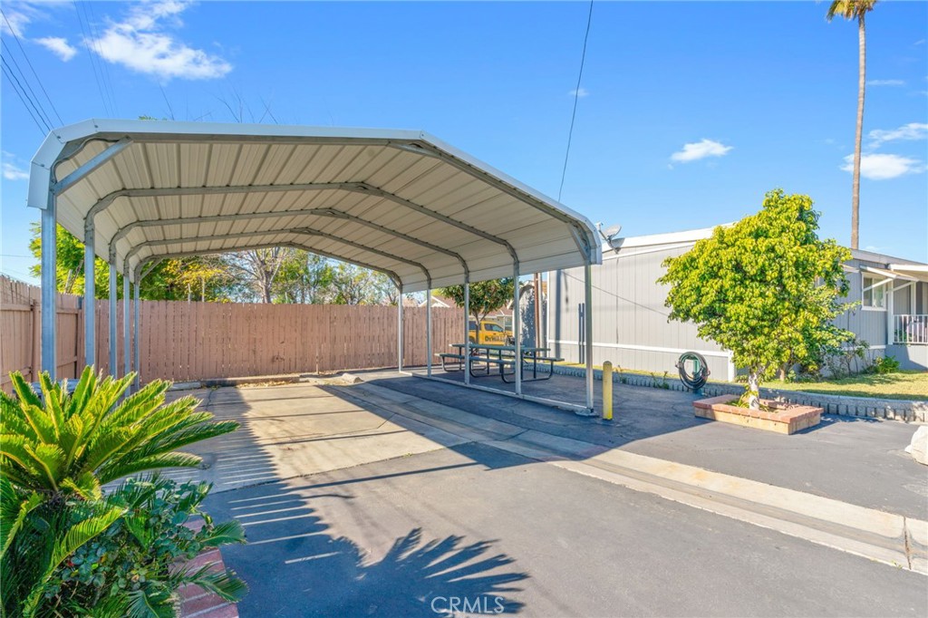 26235 9th Street, Unit 18 Highland, CA 92346 - Photo 25 of 31 a view of a swimming pool with a patio