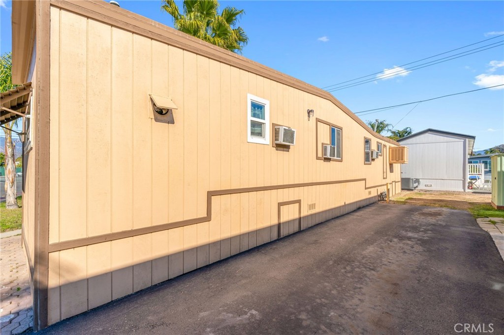 26235 9th Street, Unit 18 Highland, CA 92346 - Photo 31 of 31 a view of a house with a street