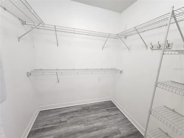 a view of a room with racks on the wall