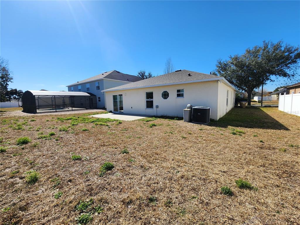 4017 Longworth Loop Kissimmee, FL 34744 - Photo 22 of 22 a view of a house with a yard