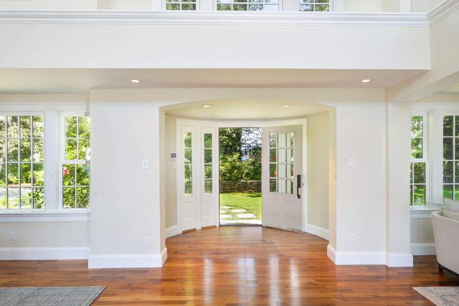 71 Sand Point Osterville, MA 02655 - Photo 11 of 45 a view of a big room with wooden floor and windows