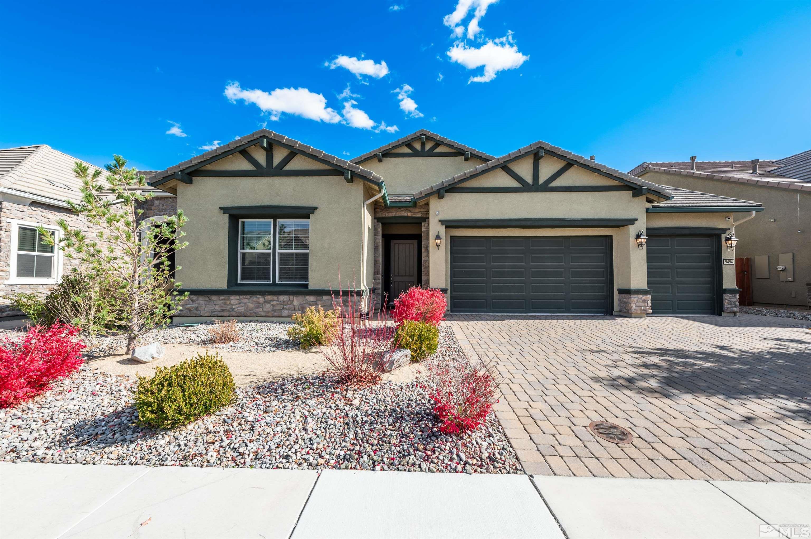 9494 Baldacci Road Reno, NV 89521 - Photo 1 of 34 a front view of a house