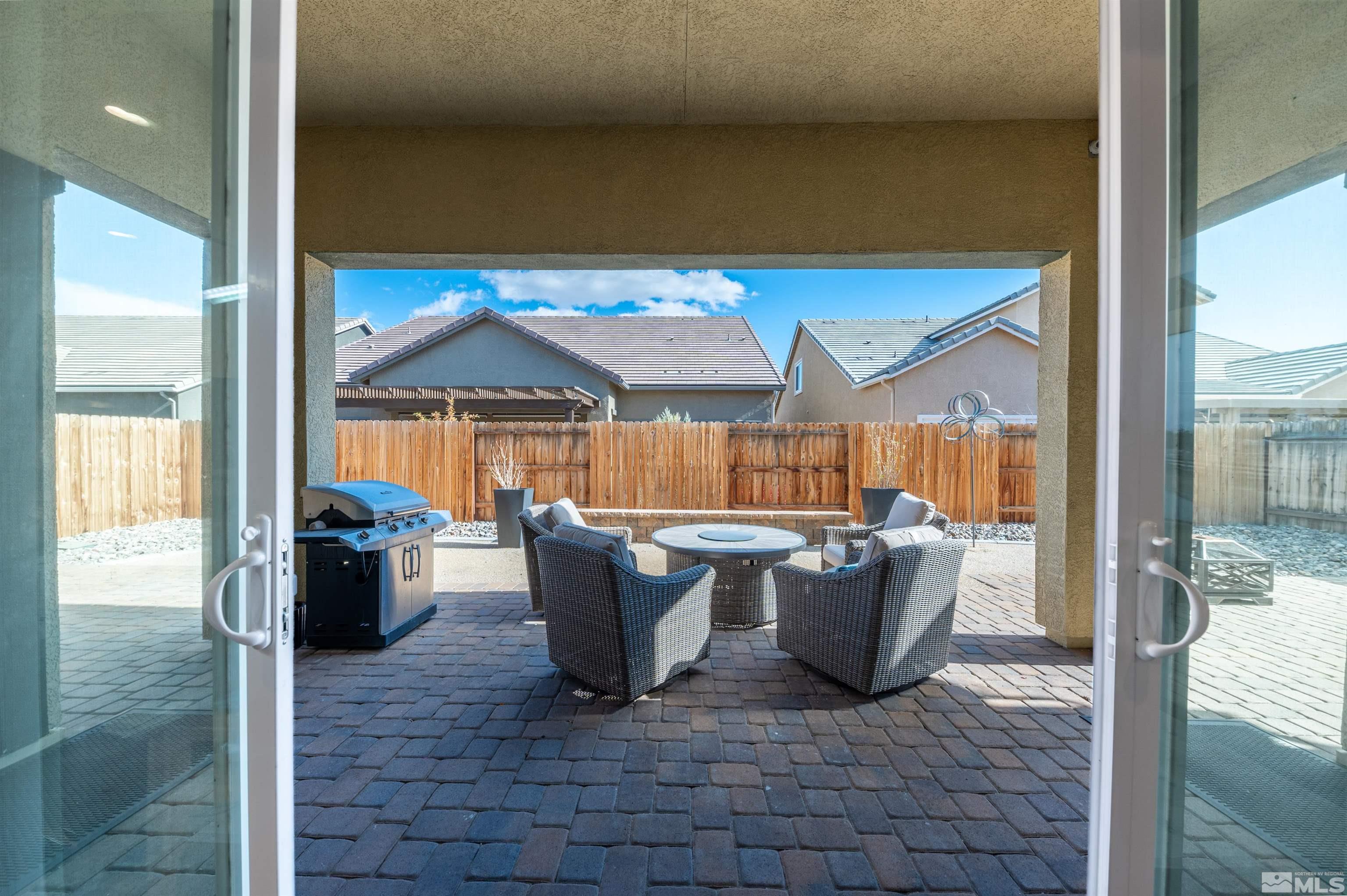 9494 Baldacci Road Reno, NV 89521 - Photo 15 of 34 a dining room with a table and chairs