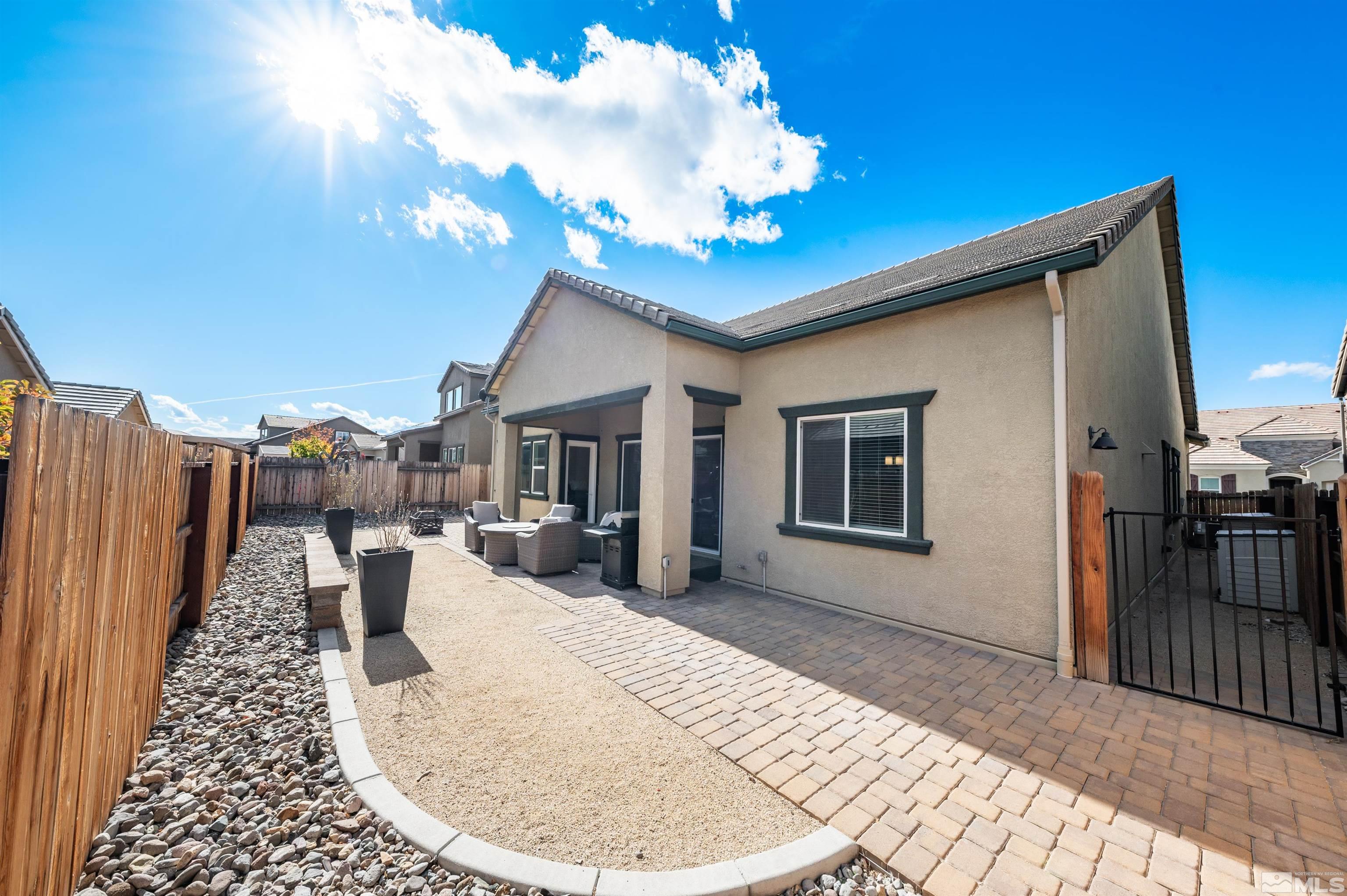 9494 Baldacci Road Reno, NV 89521 - Photo 19 of 34 a view of a house with barbeque grill