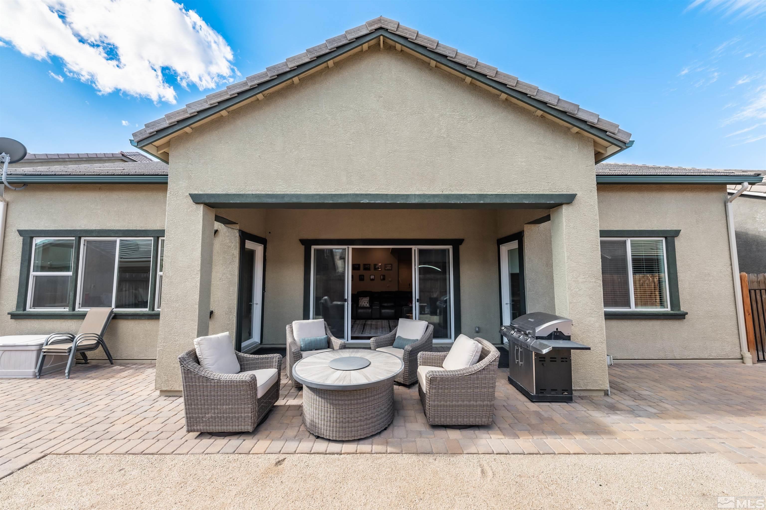 9494 Baldacci Road Reno, NV 89521 - Photo 20 of 34 a view of the house with patio
