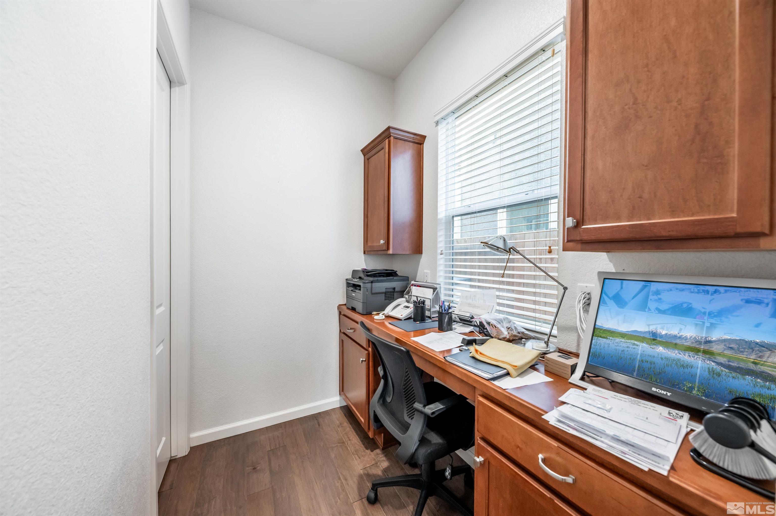 9494 Baldacci Road Reno, NV 89521 - Photo 23 of 34 a view of workspace with wooden floor
