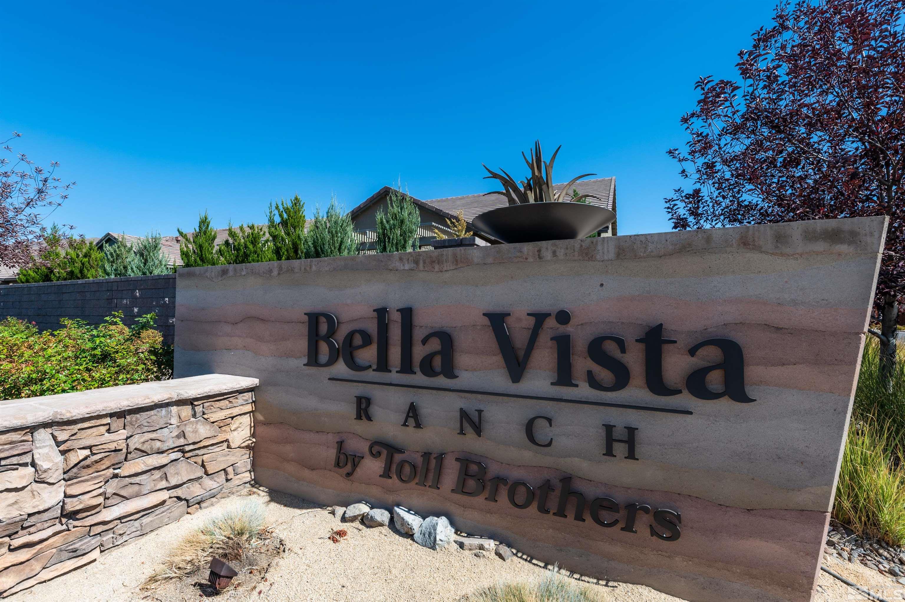9494 Baldacci Road Reno, NV 89521 - Photo 26 of 34 a view of a wooden bench under an umbrella