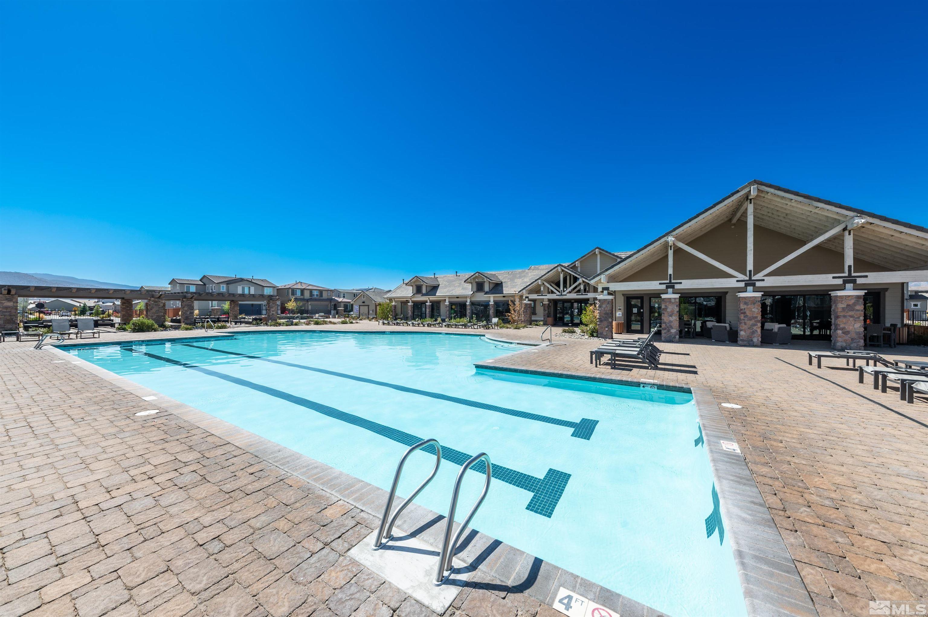 9494 Baldacci Road Reno, NV 89521 - Photo 30 of 34 a view of a house with swimming pool and sitting area