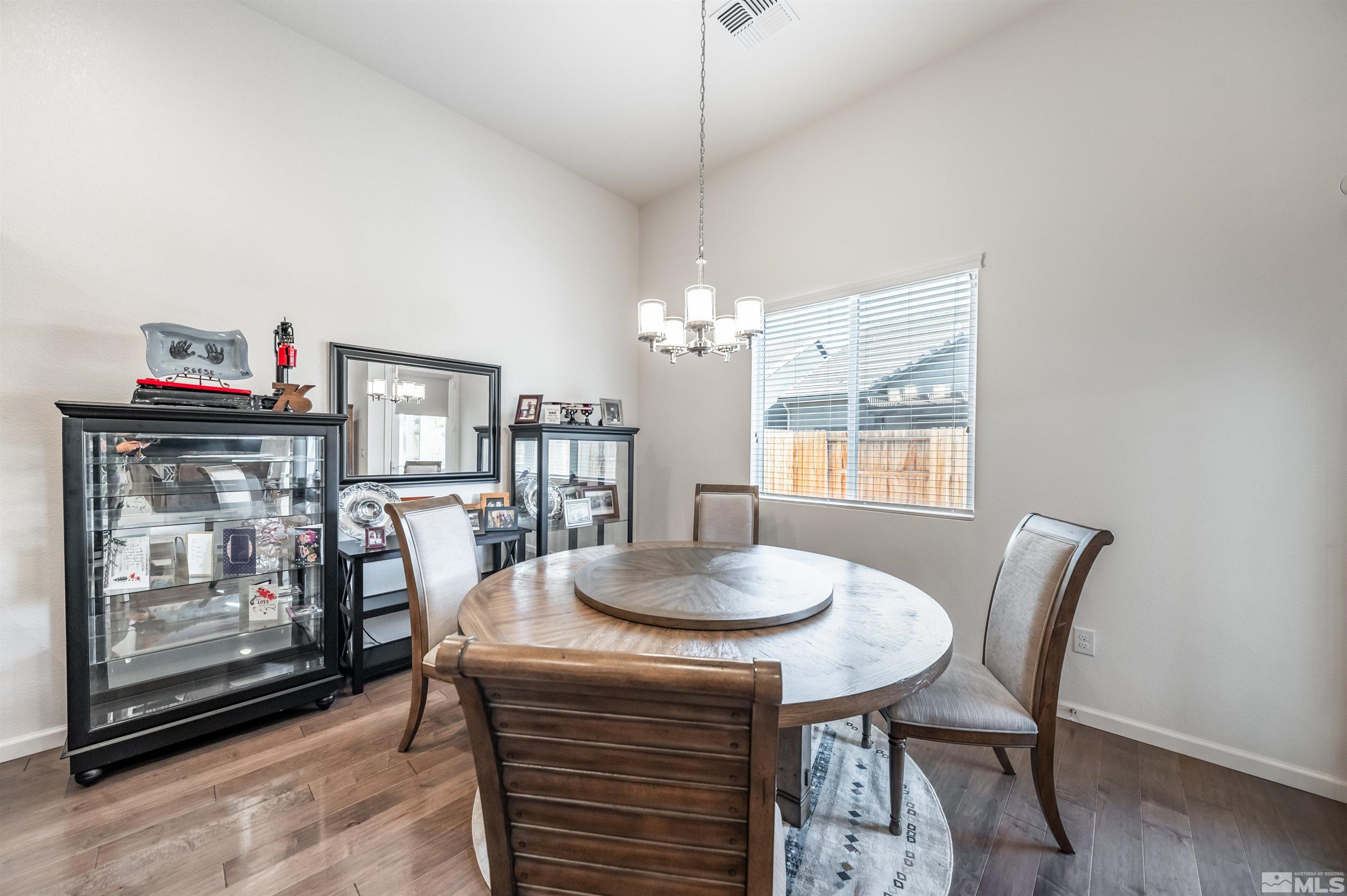 9494 Baldacci Road Reno, NV 89521 - Photo 5 of 34 a dining room with furniture and window