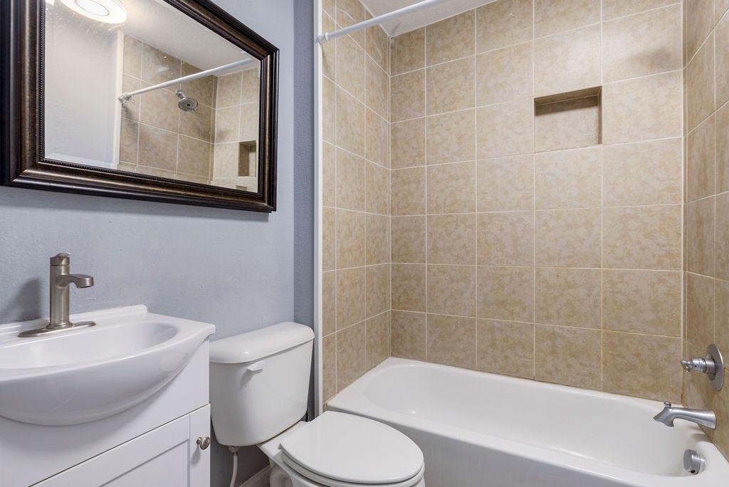 191 Elm Street Trion, GA 30753 - Photo 18 of 25 a bathroom with a toilet a sink and bathtub