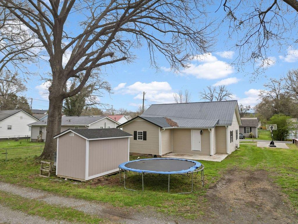 191 Elm Street Trion, GA 30753 - Photo 4 of 25 a view of a house with a yard