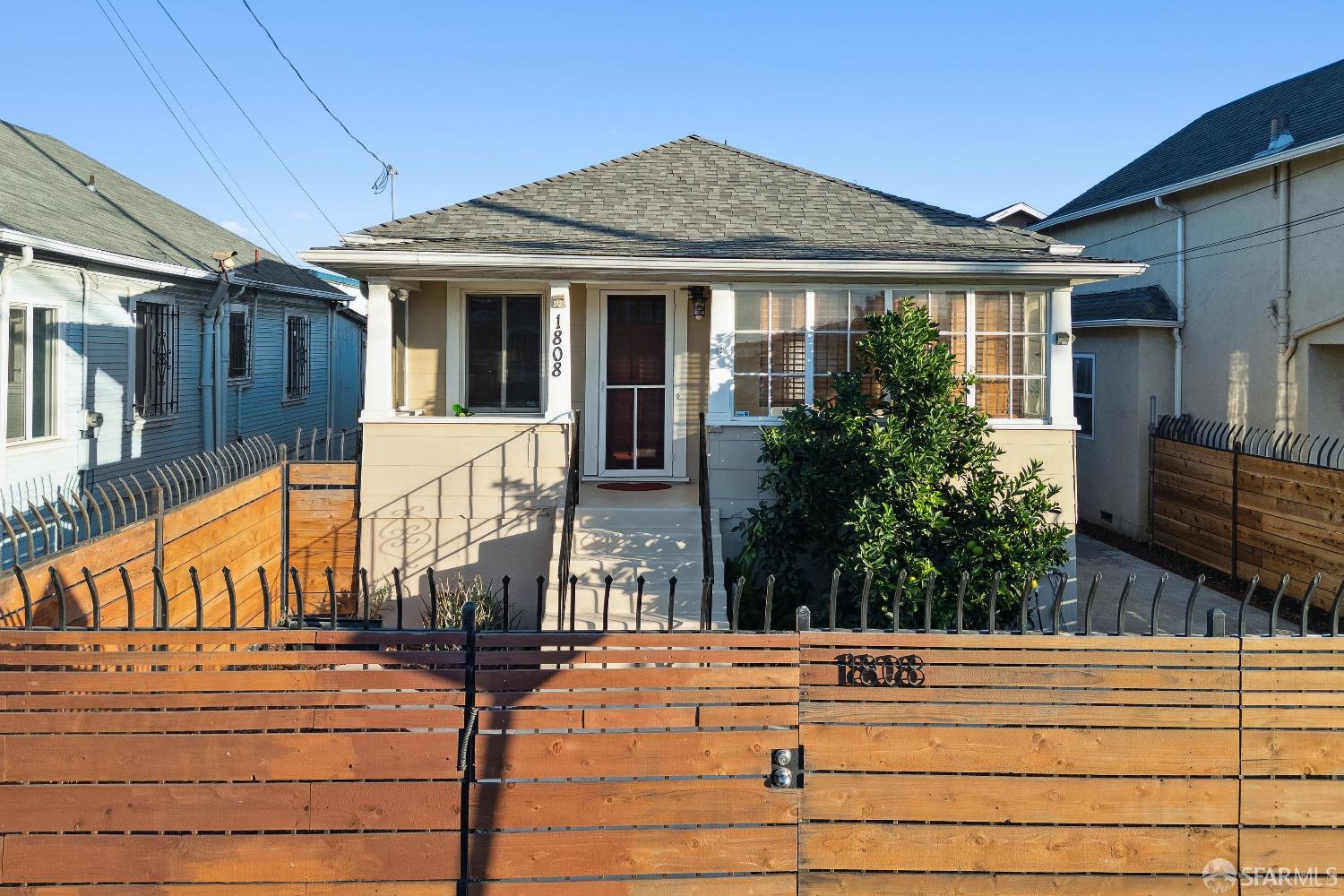 1808 40th Avenue Oakland, CA 94601 - Photo 1 of 26 a view of a house with street