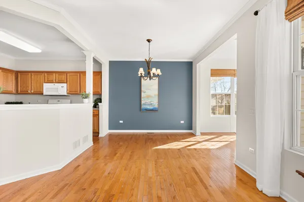 a view of a living room and kitchen
