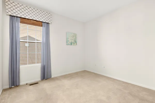 a view of hallway with wooden floor and floor