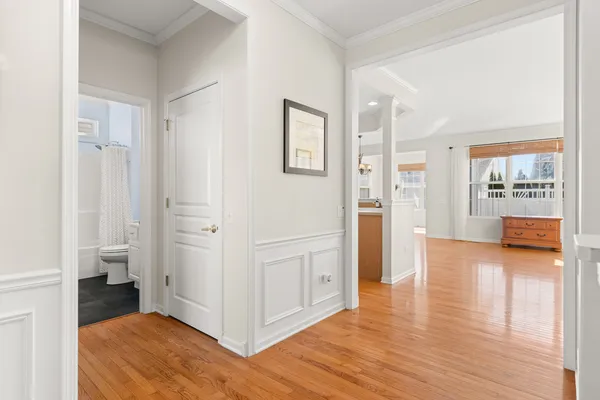 a view of a kitchen with a refrigerator and a stove