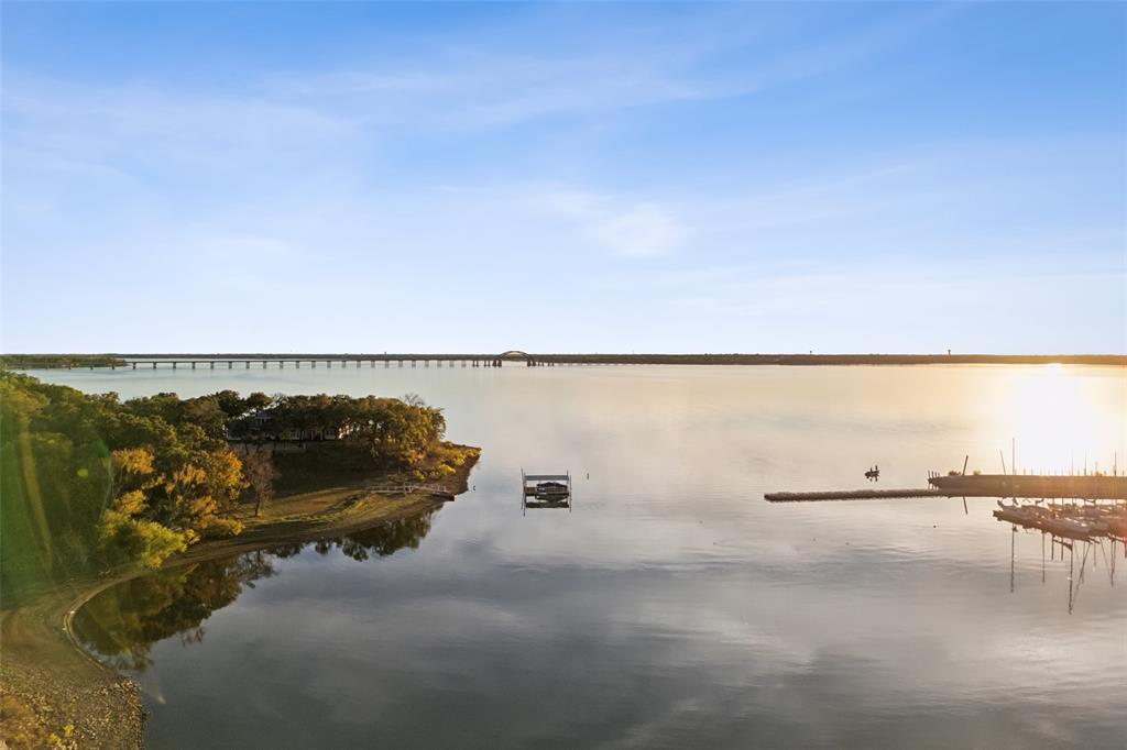 350 West Dickson Lane Oak Point, TX 75068 - Photo 12 of 23 a view of a lake with outdoor space