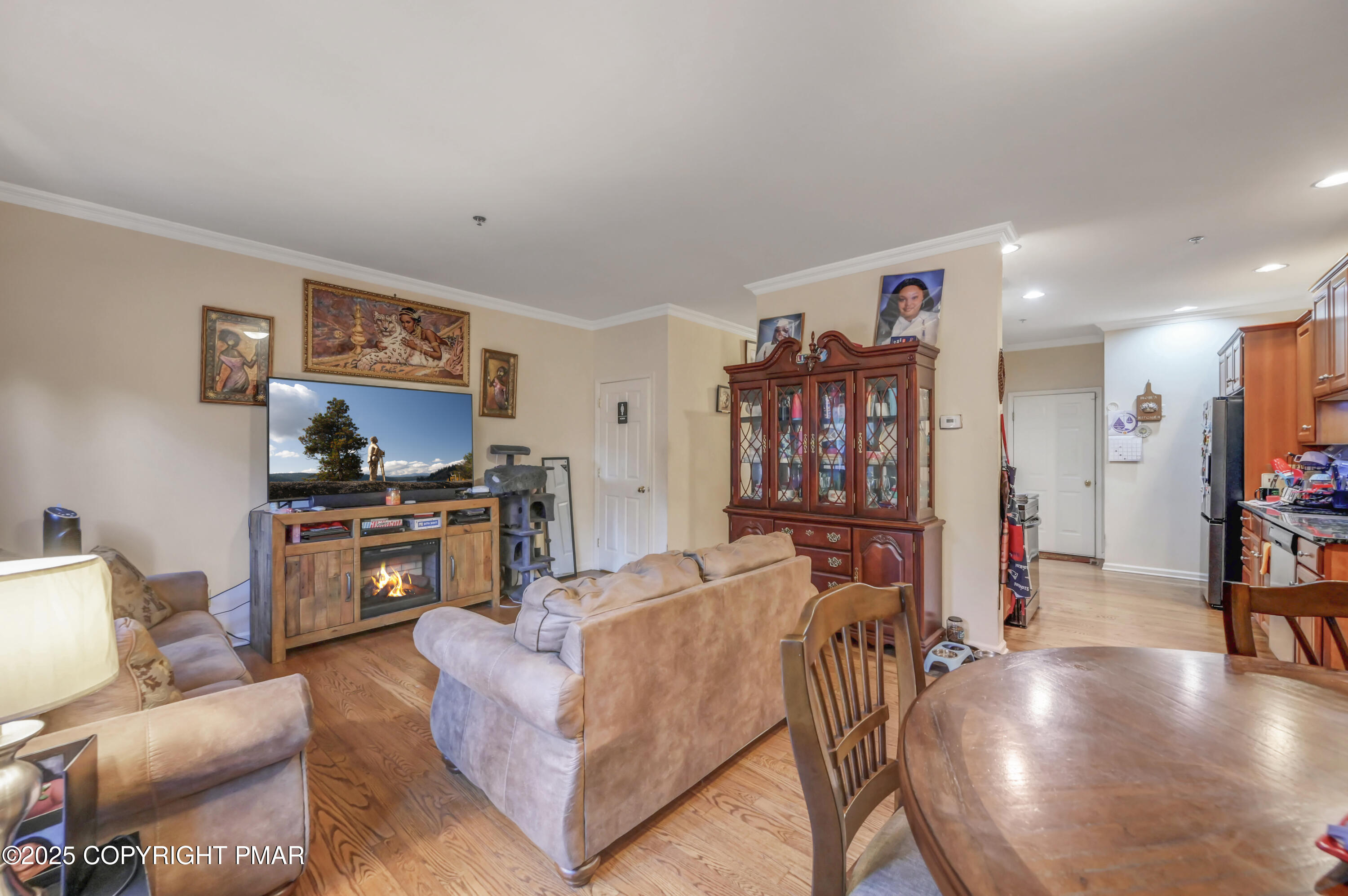 18 Elm Court, Unit UL3 East Stroudsburg, PA 18301 - Photo 14 of 48 a living room with furniture and a flat screen tv