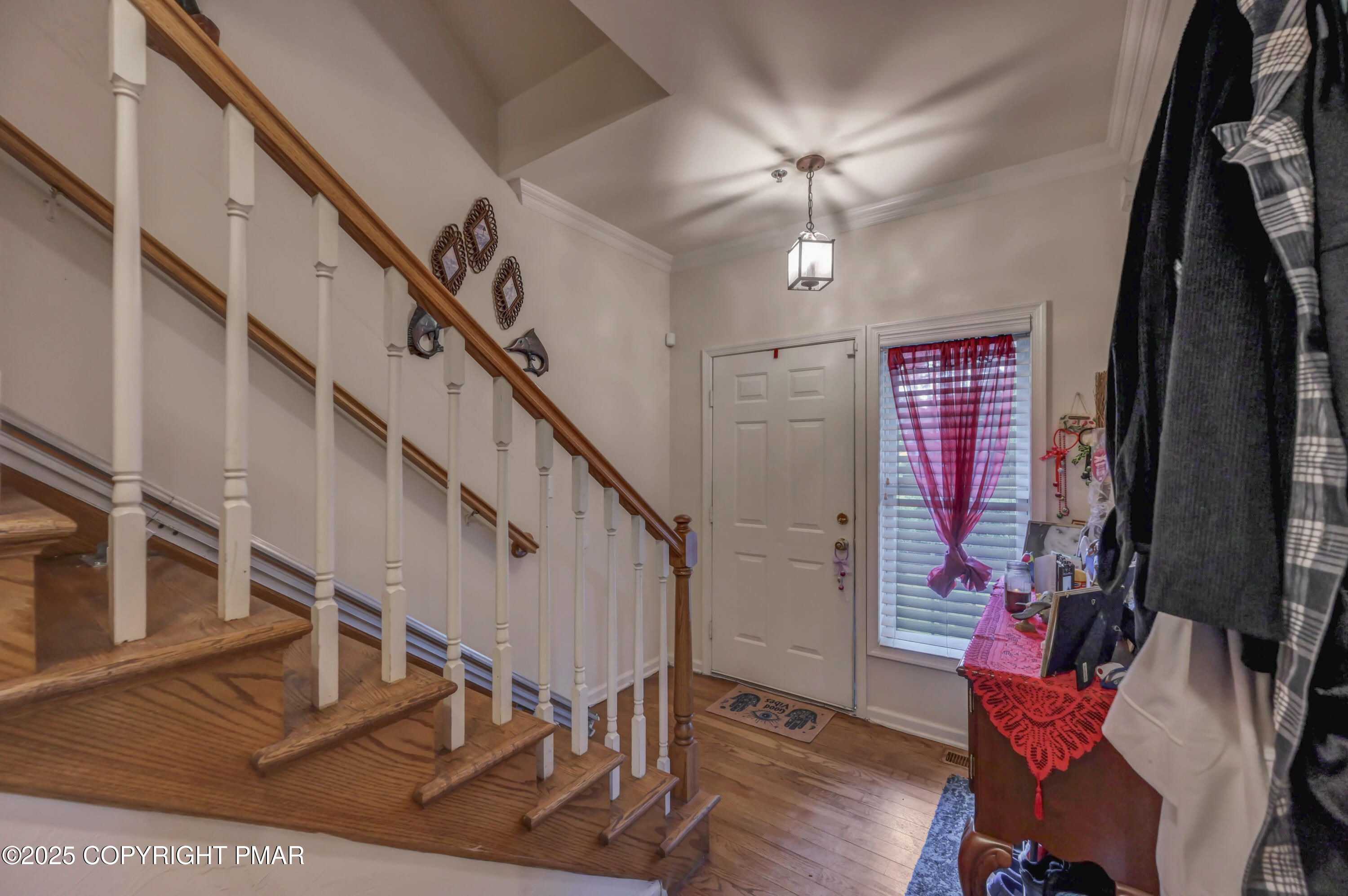 18 Elm Court, Unit UL3 East Stroudsburg, PA 18301 - Photo 22 of 48 a view of entryway with wooden floor and stairs