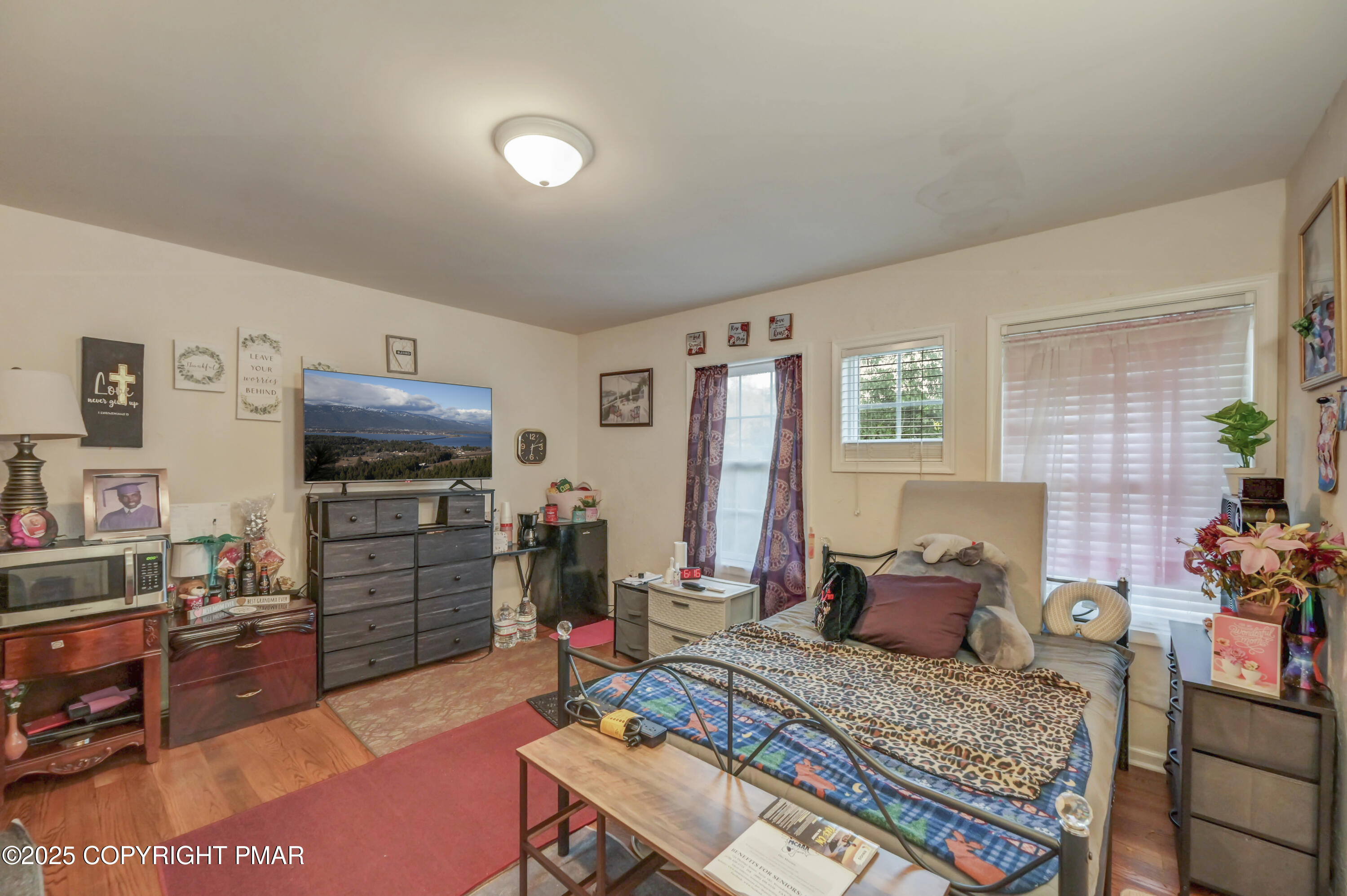 18 Elm Court, Unit UL3 East Stroudsburg, PA 18301 - Photo 24 of 48 a bedroom with furniture and a flat screen tv