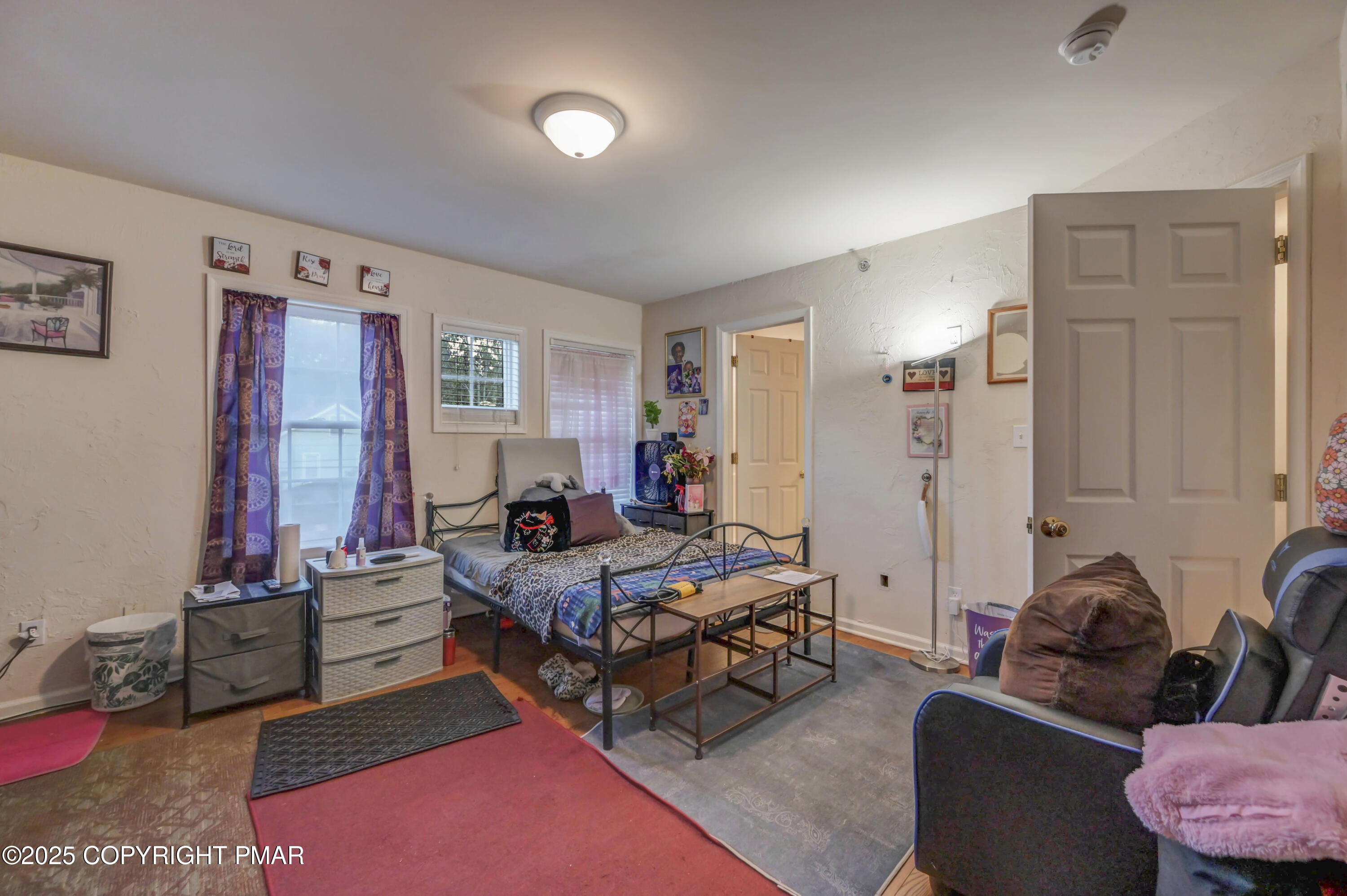 18 Elm Court, Unit UL3 East Stroudsburg, PA 18301 - Photo 25 of 48 a bedroom with furniture and a couch