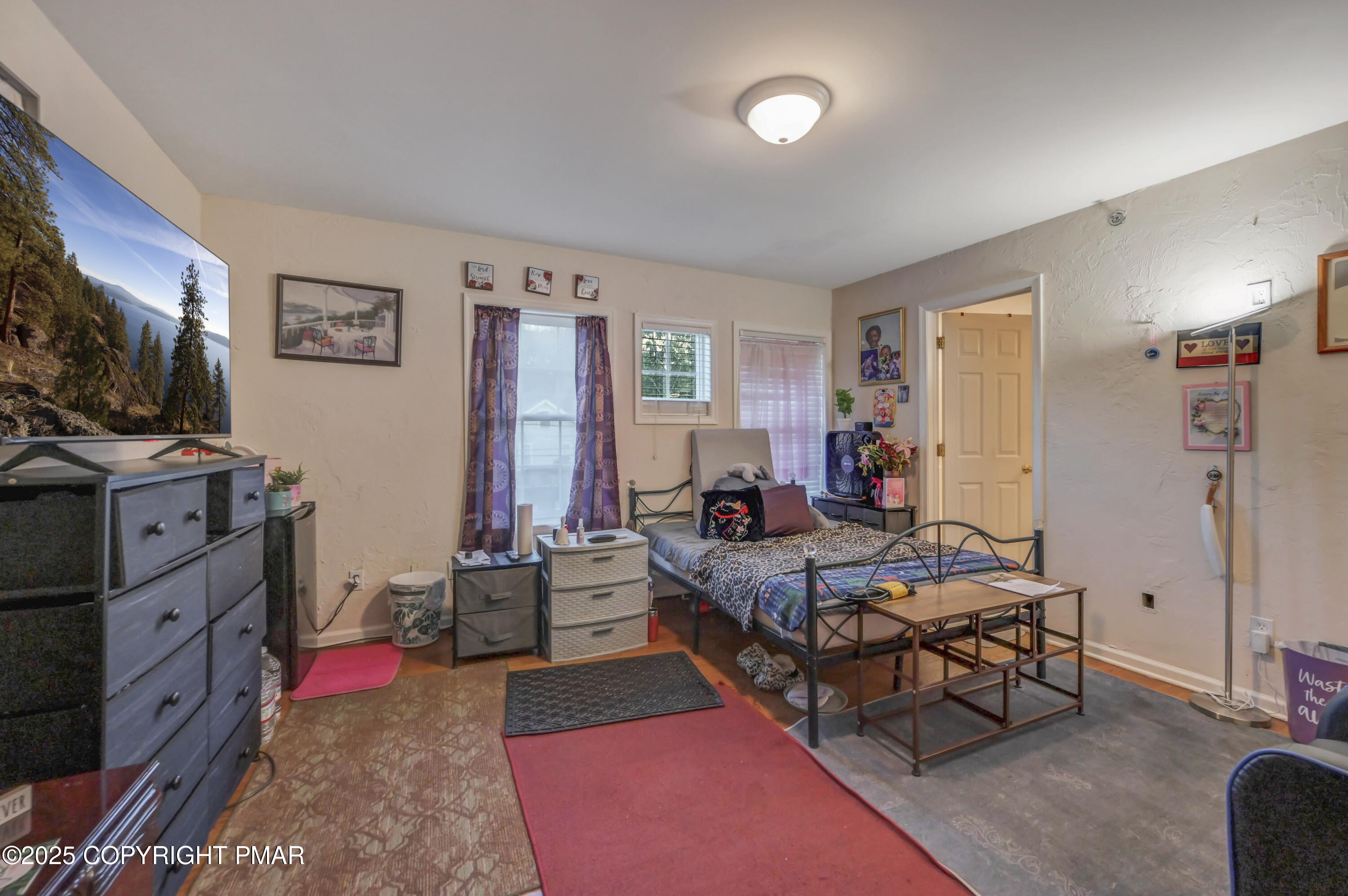 18 Elm Court, Unit UL3 East Stroudsburg, PA 18301 - Photo 26 of 48 a bedroom with furniture and a flat screen tv