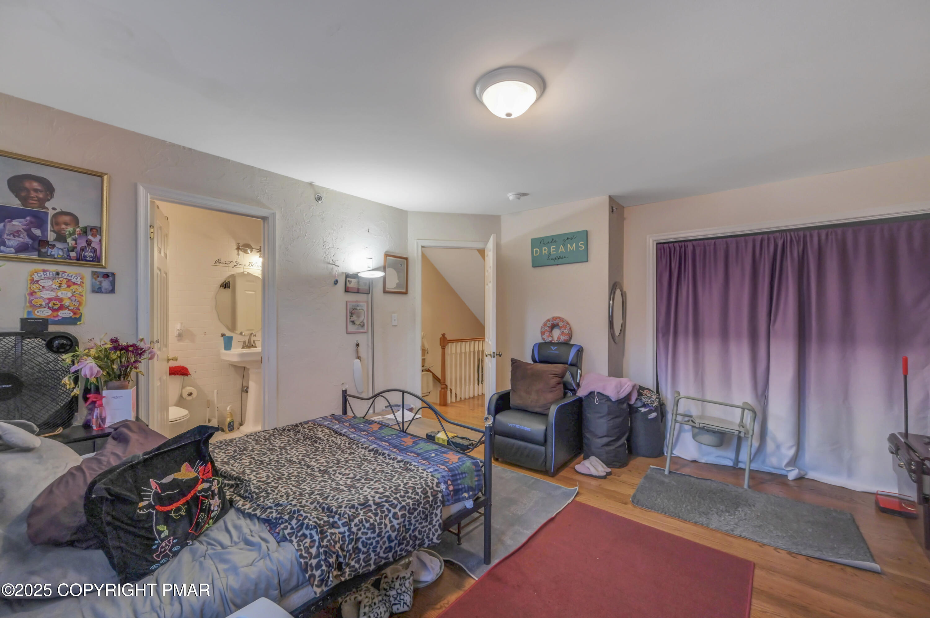 18 Elm Court, Unit UL3 East Stroudsburg, PA 18301 - Photo 27 of 48 a bedroom with furniture and a wooden floor