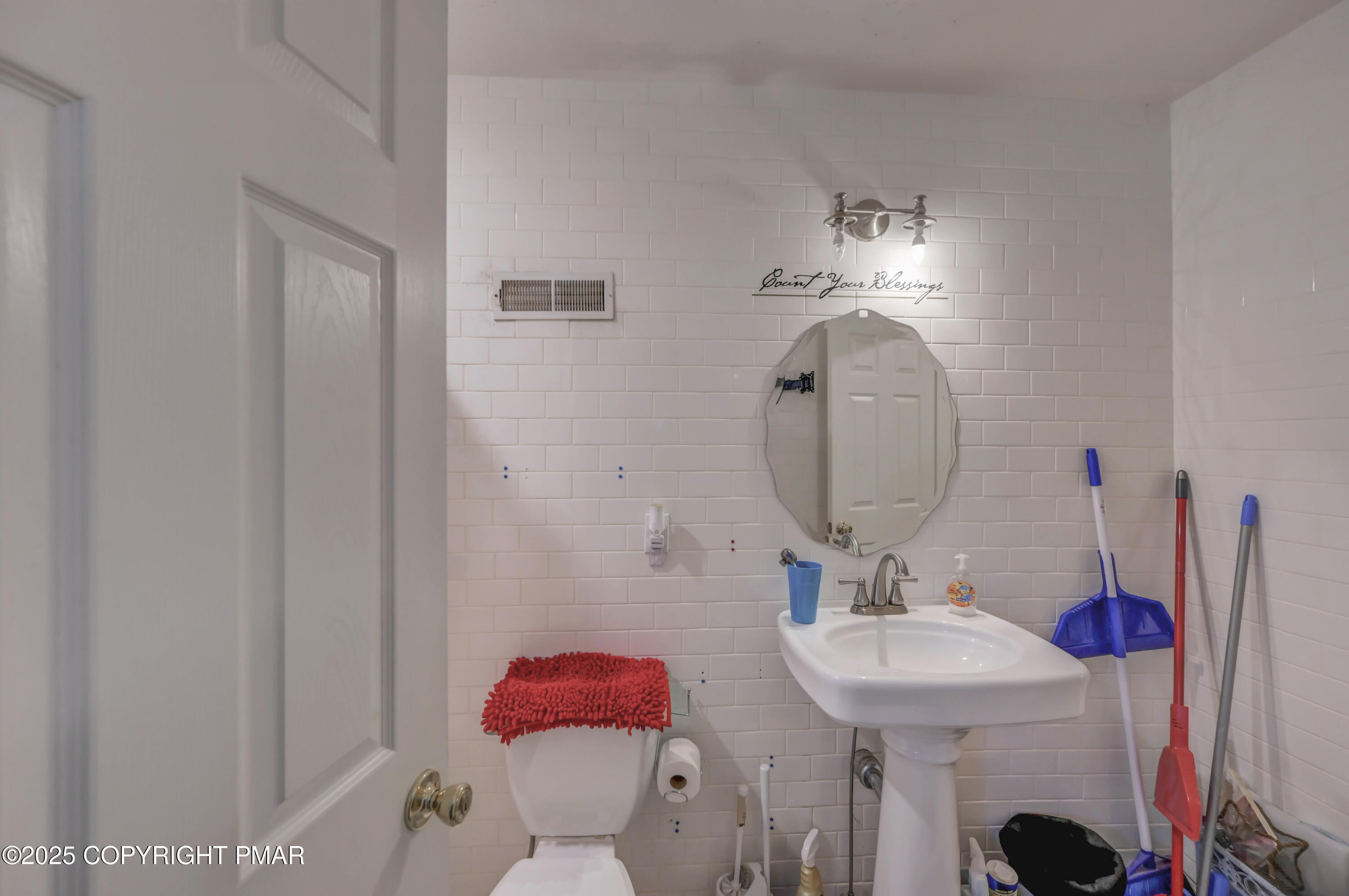 18 Elm Court, Unit UL3 East Stroudsburg, PA 18301 - Photo 28 of 48 a bathroom with a sink and a mirror