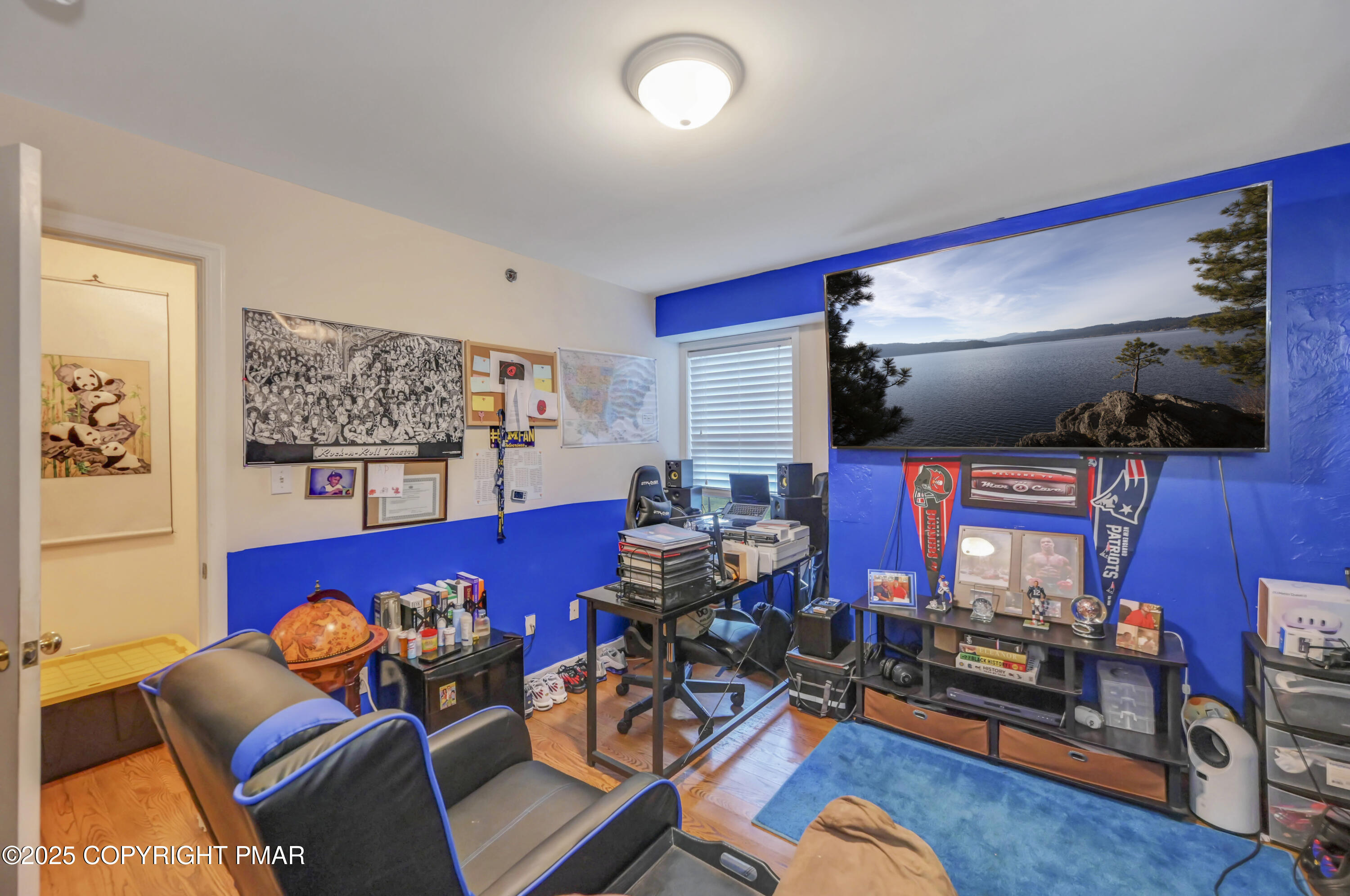 18 Elm Court, Unit UL3 East Stroudsburg, PA 18301 - Photo 34 of 48 a living room with furniture and a flat screen tv
