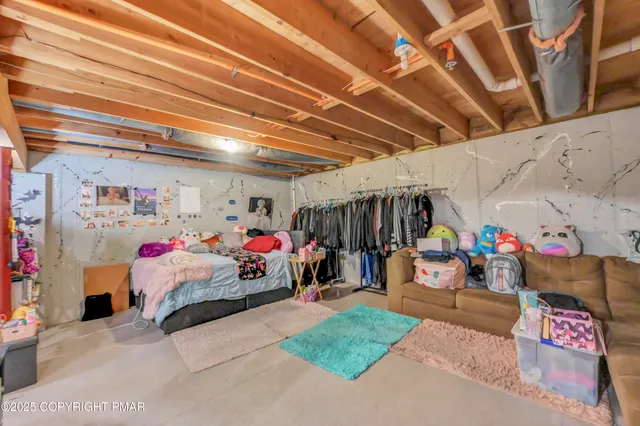 a view of house with backyard and outdoor seating