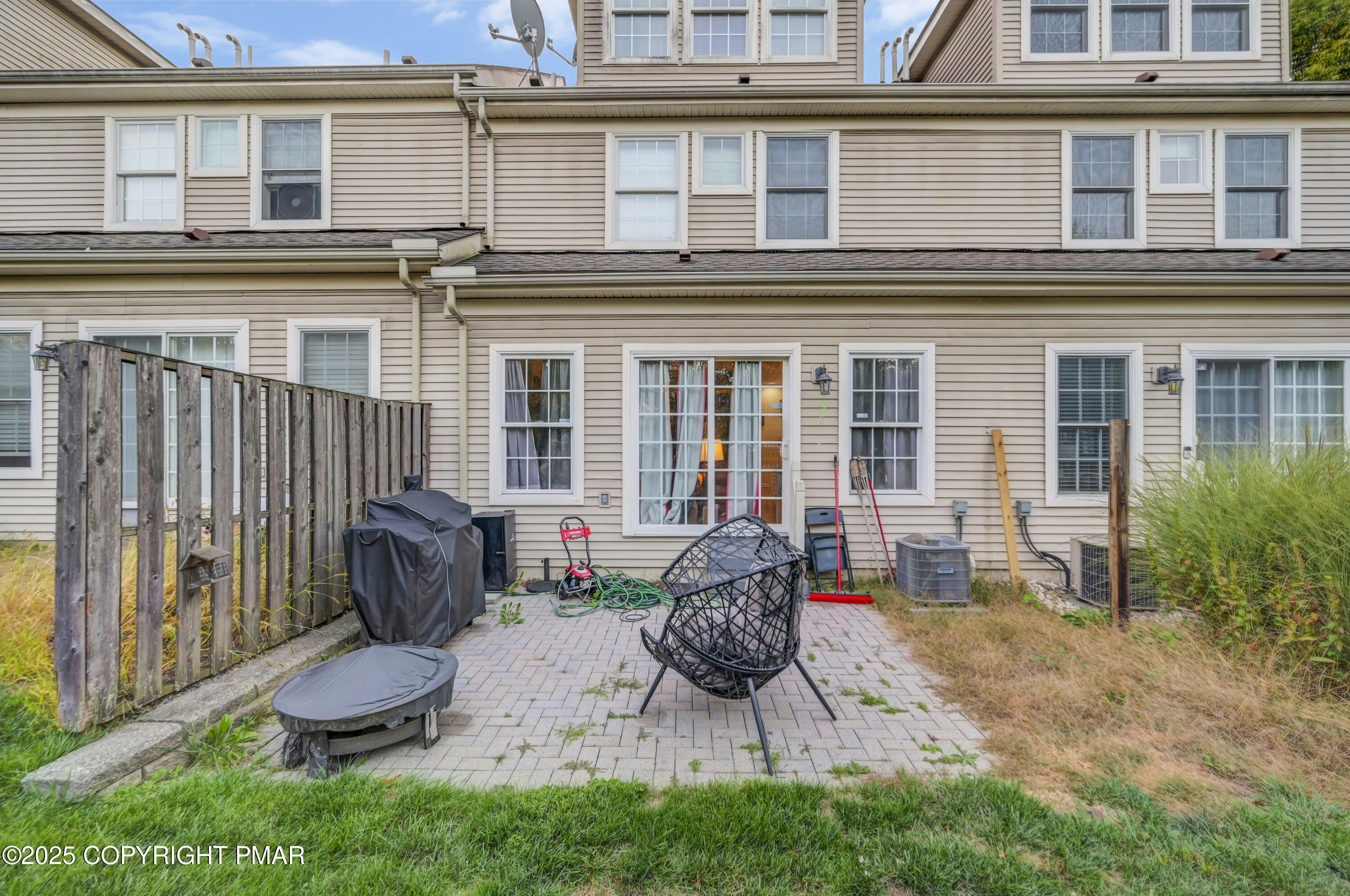 18 Elm Court, Unit UL3 East Stroudsburg, PA 18301 - Photo 47 of 48 a backyard of a house with seating space
