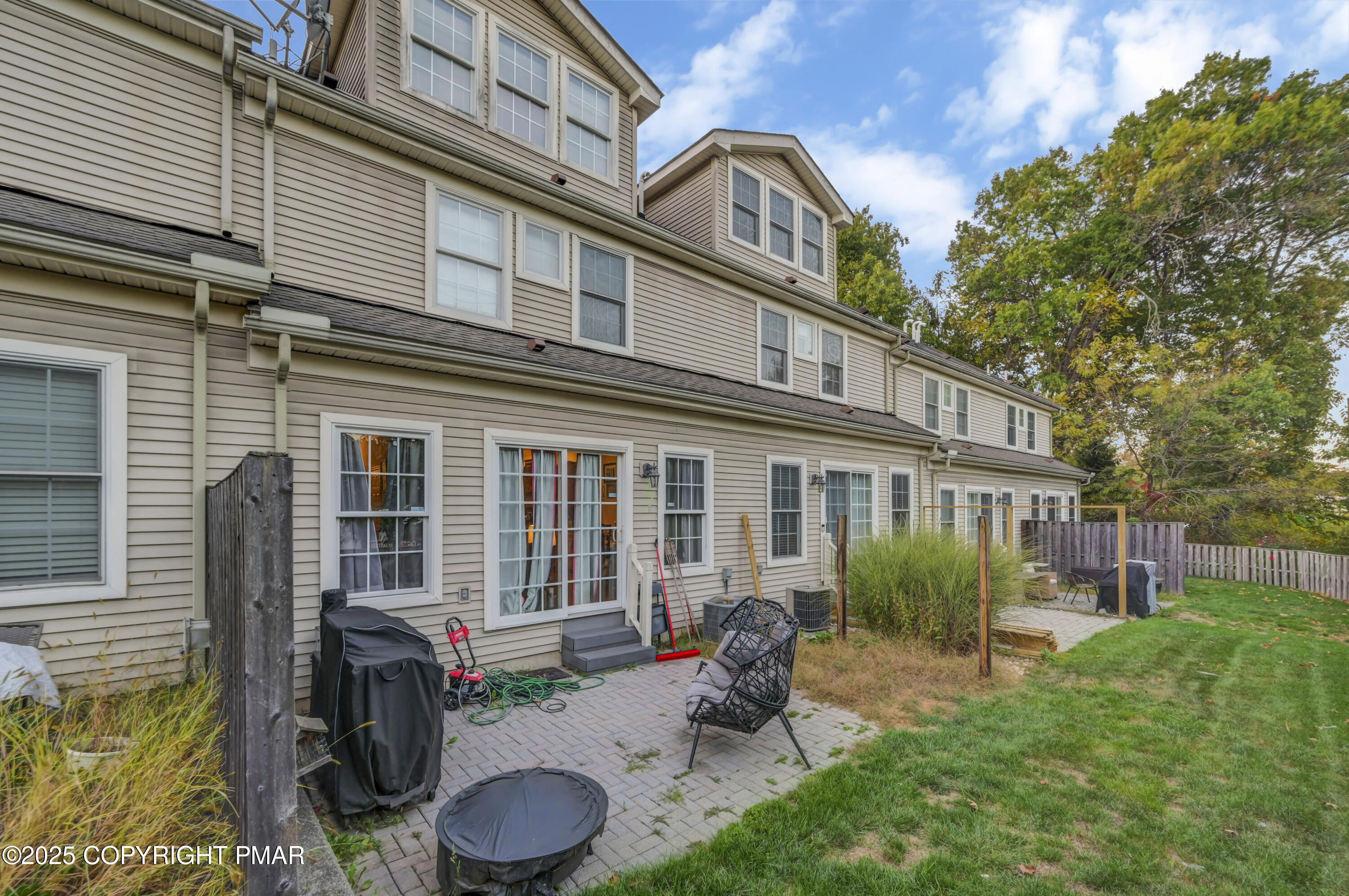 18 Elm Court, Unit UL3 East Stroudsburg, PA 18301 - Photo 48 of 48 a backyard of a house with yard fire pit and outdoor seating