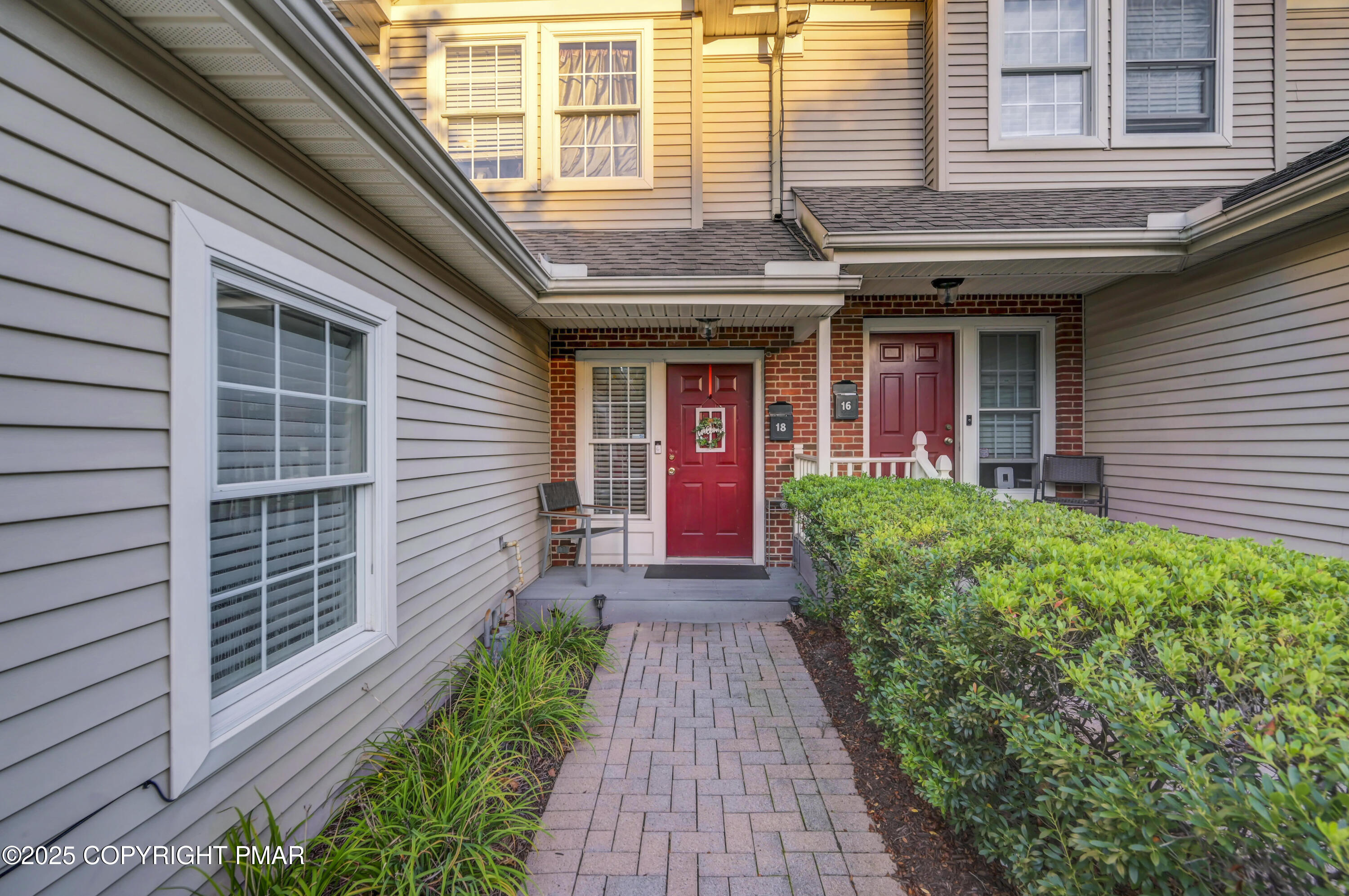 18 Elm Court, Unit UL3 East Stroudsburg, PA 18301 - Photo 5 of 48 a view of brick house with large windows