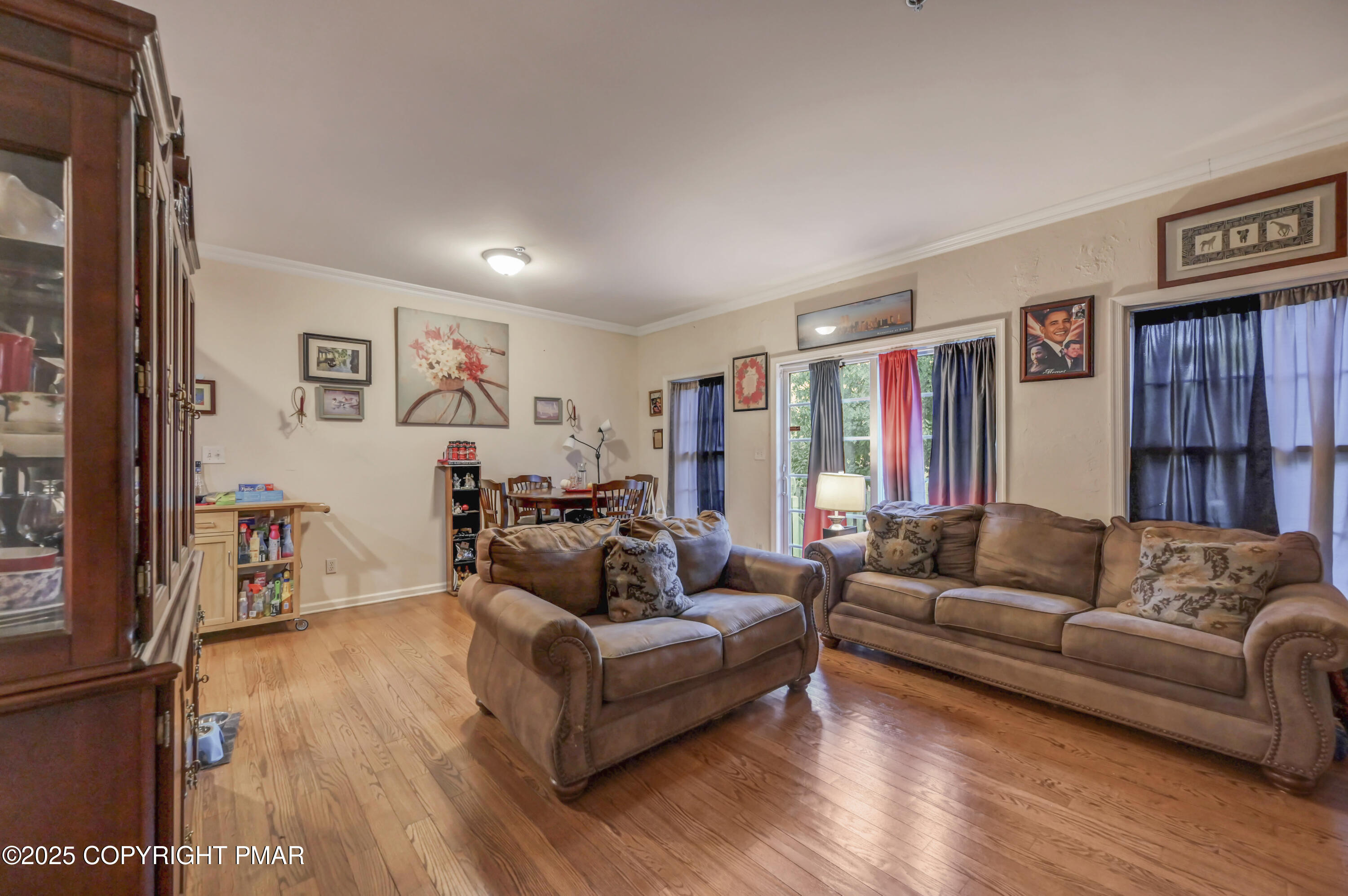 18 Elm Court, Unit UL3 East Stroudsburg, PA 18301 - Photo 8 of 48 a living room with furniture and a wooden floor