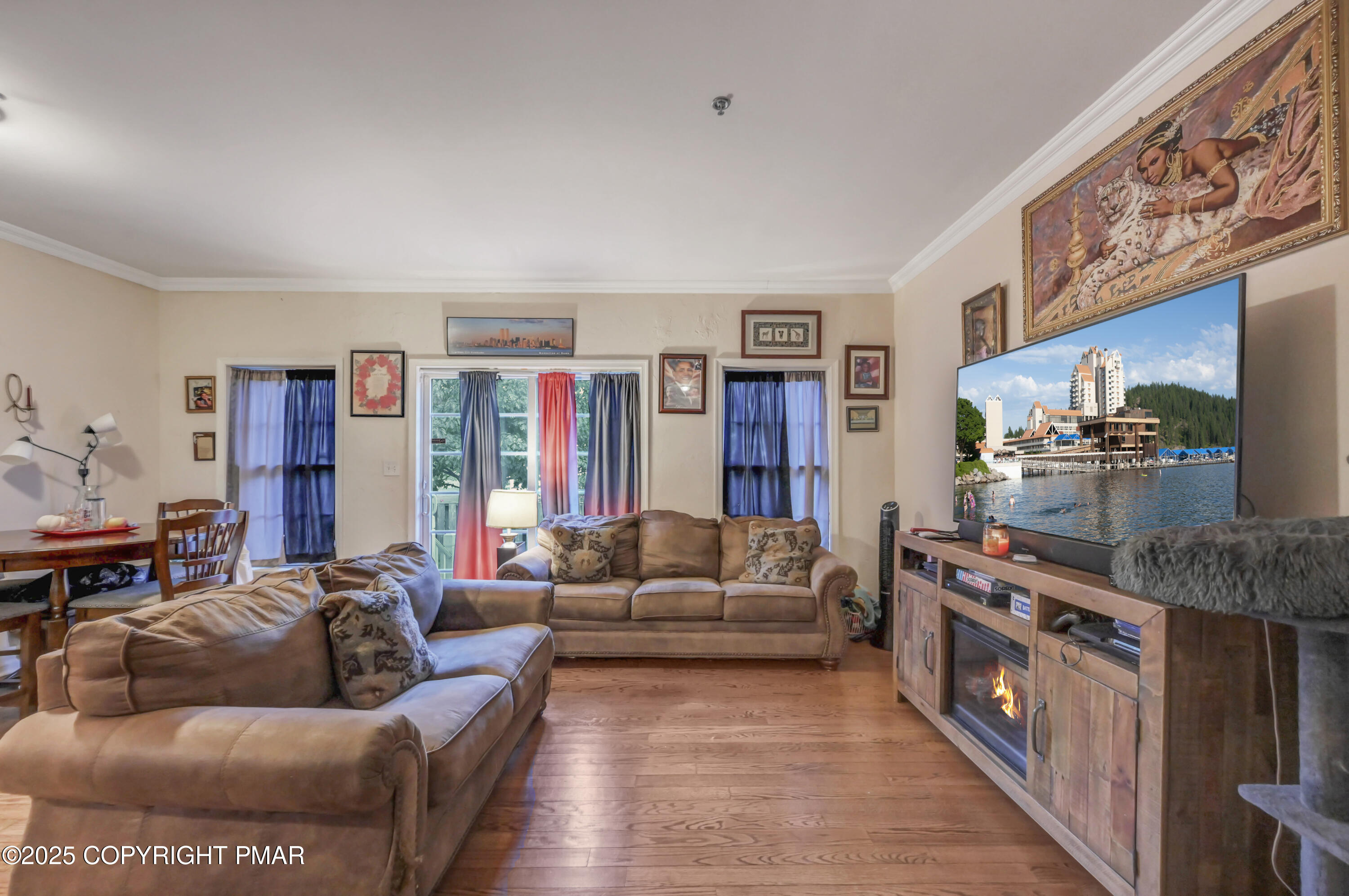18 Elm Court, Unit UL3 East Stroudsburg, PA 18301 - Photo 9 of 48 a living room with furniture and a flat screen tv